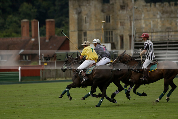 La Tremenda (lilac) v Maiz Dulce (yellow) in a Brecknock Cup polo match played on Lawns 1 at the Cowdray Park Polo Club on Tuesday 13 August 2013
