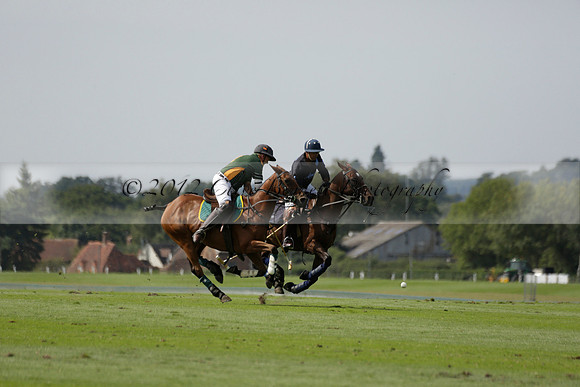 Maiz Dulce (green) v River (blue) in a Uber Polo Midsummer 12 goal polo match on Wednesday 21 August 2013 at Cowdray park Polo Club on Ambersham 2.  www.polopictures.co.uk