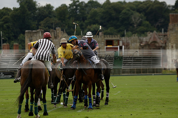 La Tremenda (lilac) v Maiz Dulce (yellow) in a Brecknock Cup polo match played on Lawns 1 at the Cowdray Park Polo Club on Tuesday 13 August 2013