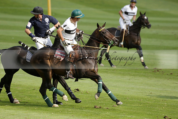 Pandas (white) v Home Farm (navy) in a Park House West Sussex Cup Polo match on Brooksfield at Cowdray Park Polo Club on Friday 30 August 2013. 2013.08.30 www.polopictures.co.uk