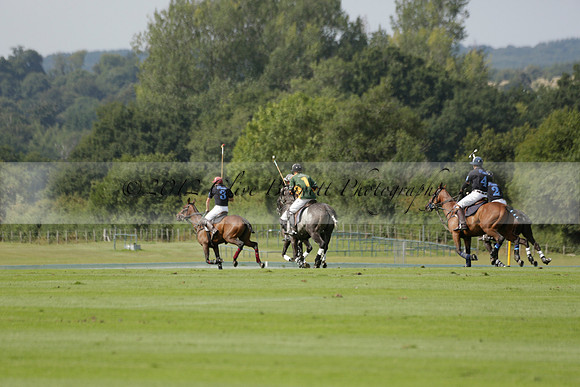 Maiz Dulce (green) v River (blue) in a Uber Polo Midsummer 12 goal polo match on Wednesday 21 August 2013 at Cowdray park Polo Club on Ambersham 2.  www.polopictures.co.uk