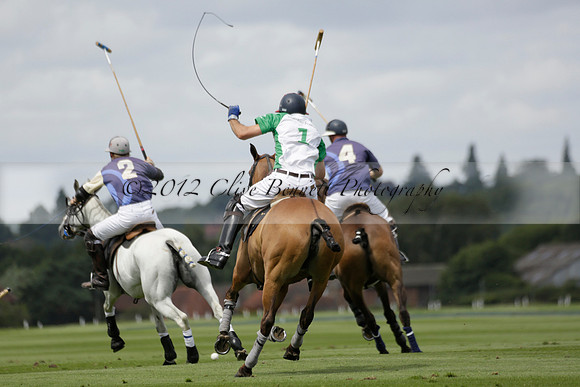 Burningfold (blue) v Wairakei Pastoral (green) in the Ruins Cup Final on Sunday 04 August 2013.