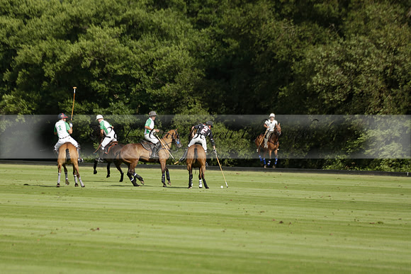 Jaeger Le Coultre (black)  v Wairakei Pastoral (white) in a Jaeger Le Coultre Holden White Cup polo match played on 29 July 2013 at Cowdray Park Polo Club on Brooksfieldwww.polopictures.co.uk