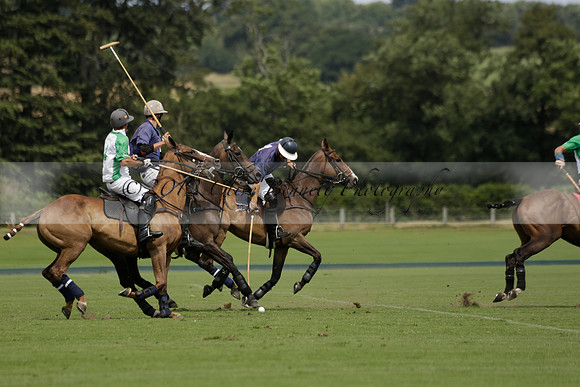 Burningfold (blue) v Wairakei Pastoral (green) in the Ruins Cup Final on Sunday 04 August 2013.