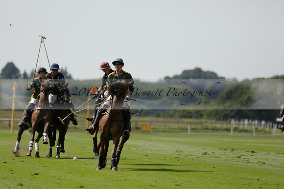 Maiz Dulce (green) v River (blue) in a Uber Polo Midsummer 12 goal polo match on Wednesday 21 August 2013 at Cowdray park Polo Club on Ambersham 2.  www.polopictures.co.uk