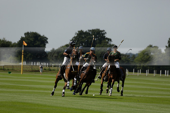 Maiz Dulce (green) v River (blue) in a Uber Polo Midsummer 12 goal polo match on Wednesday 21 August 2013 at Cowdray park Polo Club on Ambersham 2.  www.polopictures.co.uk