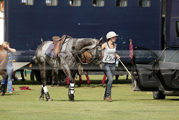 Maiz Dulce (green) v River (blue) in a Uber Polo Midsummer 12 goal polo match on Wednesday 21 August 2013 at Cowdray park Polo Club on Ambersham 2.  www.polopictures.co.uk