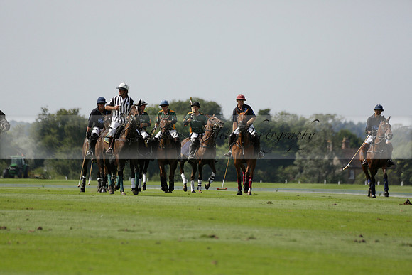 Maiz Dulce (green) v River (blue) in a Uber Polo Midsummer 12 goal polo match on Wednesday 21 August 2013 at Cowdray park Polo Club on Ambersham 2.  www.polopictures.co.uk