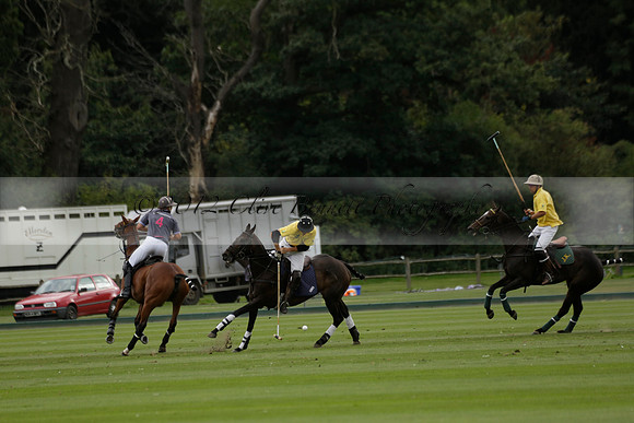 La Tremenda (lilac) v Maiz Dulce (yellow) in a Brecknock Cup polo match played on Lawns 1 at the Cowdray Park Polo Club on Tuesday 13 August 2013
