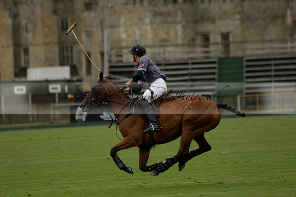 La Tremenda (lilac) v Maiz Dulce (yellow) in a Brecknock Cup polo match played on Lawns 1 at the Cowdray Park Polo Club on Tuesday 13 August 2013