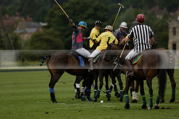 La Tremenda (lilac) v Maiz Dulce (yellow) in a Brecknock Cup polo match played on Lawns 1 at the Cowdray Park Polo Club on Tuesday 13 August 2013