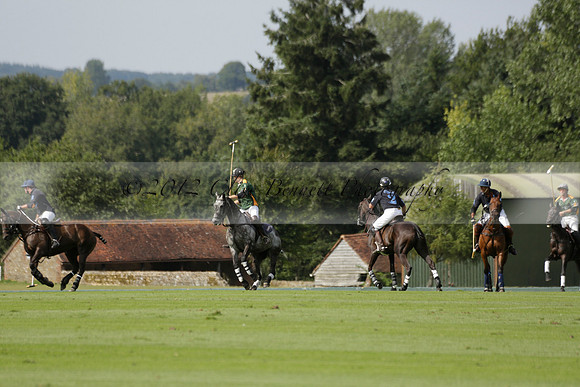Maiz Dulce (green) v River (blue) in a Uber Polo Midsummer 12 goal polo match on Wednesday 21 August 2013 at Cowdray park Polo Club on Ambersham 2.  www.polopictures.co.uk