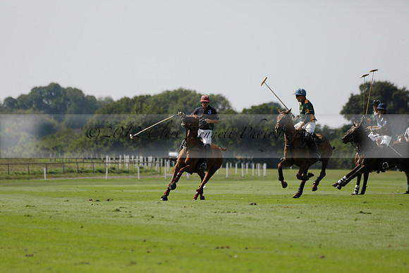 Maiz Dulce (green) v River (blue) in a Uber Polo Midsummer 12 goal polo match on Wednesday 21 August 2013 at Cowdray park Polo Club on Ambersham 2.  www.polopictures.co.uk