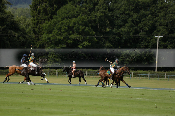 Maiz Dulce (green) v River (blue) in a Uber Polo Midsummer 12 goal polo match on Wednesday 21 August 2013 at Cowdray park Polo Club on Ambersham 2.  www.polopictures.co.uk