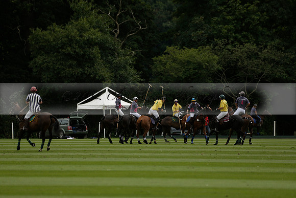 La Tremenda (lilac) v Maiz Dulce (yellow) in a Brecknock Cup polo match played on Lawns 1 at the Cowdray Park Polo Club on Tuesday 13 August 2013