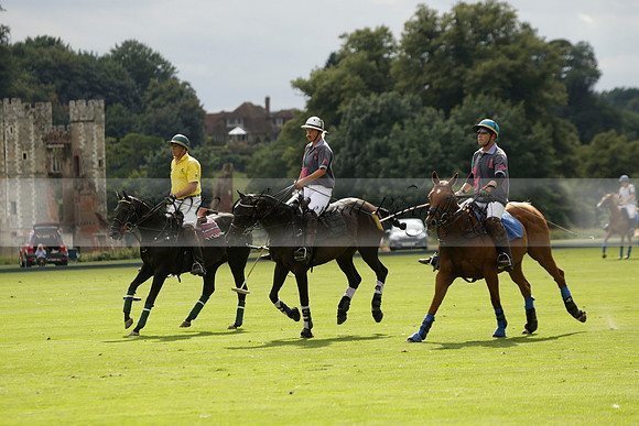 La Tremenda (lilac) v Maiz Dulce (yellow) in a Brecknock Cup polo match played on Lawns 1 at the Cowdray Park Polo Club on Tuesday 13 August 2013