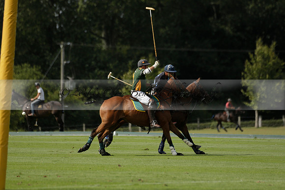 Maiz Dulce (green) v River (blue) in a Uber Polo Midsummer 12 goal polo match on Wednesday 21 August 2013 at Cowdray park Polo Club on Ambersham 2.  www.polopictures.co.uk