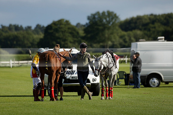 Aryana (black) v Shoreline (yellow) in a Farewell Cup polo match played on Ambersham 5 at Cowdray Park Polo Club on Wednesday 18 September 2013. www.polopictures.co.uk