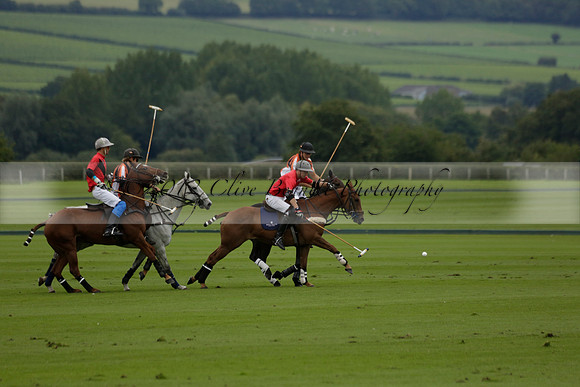 Four Quarters Black (black) v Clashleigh (red) in the Autumn Cup subsidiary final polo match on Ambersham 2 at Cowdray Park Polo Club on Sunday 22 September 2013 www.polopictures.co.uk