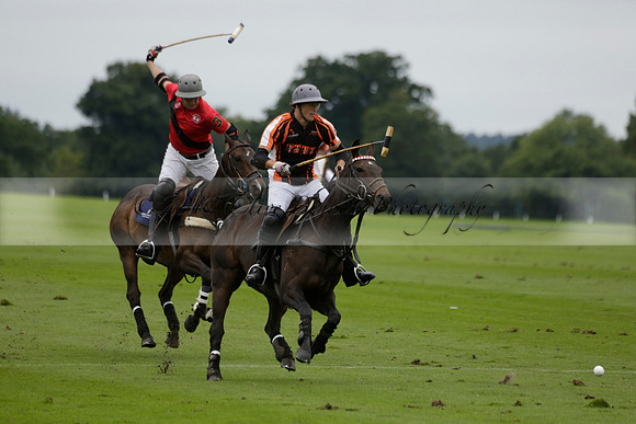 Four Quarters Black (black) v Clashleigh (red) in the Autumn Cup subsidiary final polo match on Ambersham 2 at Cowdray Park Polo Club on Sunday 22 September 2013 www.polopictures.co.uk