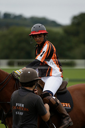 Four Quarters Black (black) v Clashleigh (red) in the Autumn Cup subsidiary final polo match on Ambersham 2 at Cowdray Park Polo Club on Sunday 22 September 2013 www.polopictures.co.uk