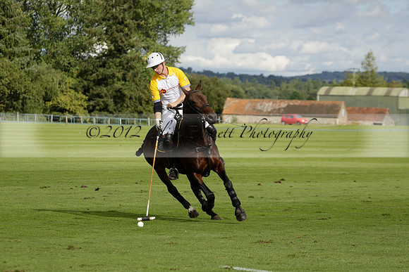 Aryana (black) v Shoreline (yellow) in a Farewell Cup polo match played on Ambersham 5 at Cowdray Park Polo Club on Wednesday 18 September 2013. www.polopictures.co.uk