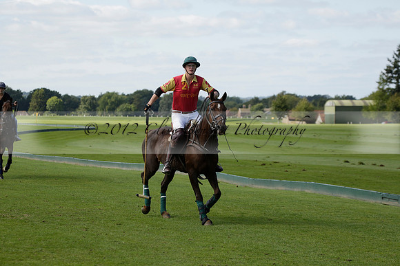 Four Quarters Black (black) v BHC (red) in a Autumn Cup polo match on Ambersham 2 at Cowdray Park Polo Club on Friday 20 September 2013 www.polopictures.co.uk