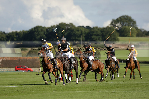 Aryana (black) v Shoreline (yellow) in a Farewell Cup polo match played on Ambersham 5 at Cowdray Park Polo Club on Wednesday 18 September 2013. www.polopictures.co.uk