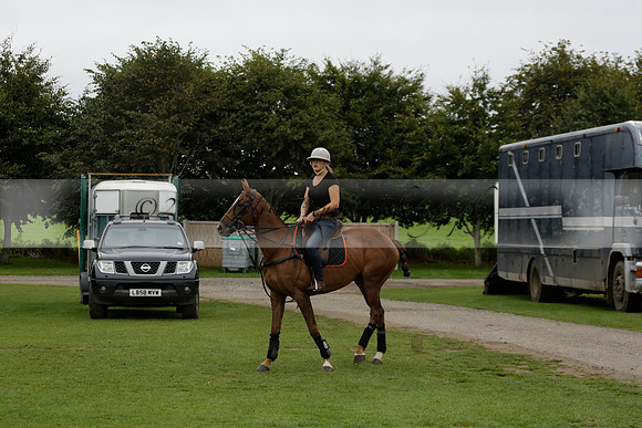 Four Quarters Black (black) v Clashleigh (red) in the Autumn Cup subsidiary final polo match on Ambersham 2 at Cowdray Park Polo Club on Sunday 22 September 2013 www.polopictures.co.uk