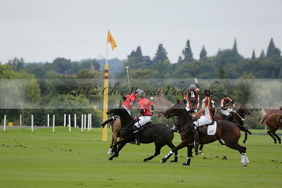 Four Quarters Black (black) v Clashleigh (red) in the Autumn Cup subsidiary final polo match on Ambersham 2 at Cowdray Park Polo Club on Sunday 22 September 2013 www.polopictures.co.uk