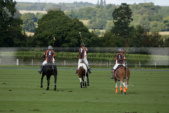 Four Quarters Black (black) v BHC (red) in a Autumn Cup polo match on Ambersham 2 at Cowdray Park Polo Club on Friday 20 September 2013 www.polopictures.co.uk