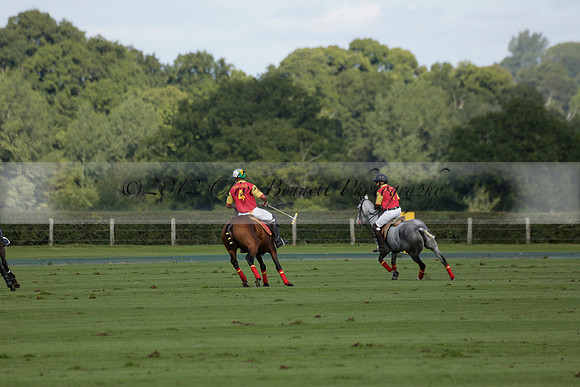 Four Quarters Black (black) v BHC (red) in a Autumn Cup polo match on Ambersham 2 at Cowdray Park Polo Club on Friday 20 September 2013 www.polopictures.co.uk
