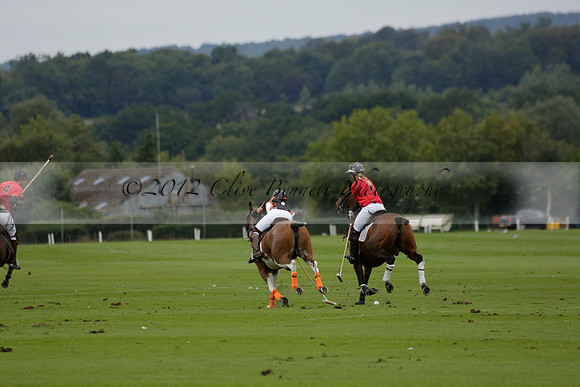 Four Quarters Black (black) v Clashleigh (red) in the Autumn Cup subsidiary final polo match on Ambersham 2 at Cowdray Park Polo Club on Sunday 22 September 2013 www.polopictures.co.uk