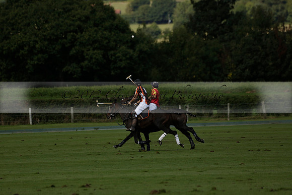 Four Quarters Black (black) v BHC (red) in a Autumn Cup polo match on Ambersham 2 at Cowdray Park Polo Club on Friday 20 September 2013 www.polopictures.co.uk