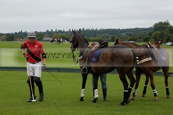 Four Quarters Black (black) v Clashleigh (red) in the Autumn Cup subsidiary final polo match on Ambersham 2 at Cowdray Park Polo Club on Sunday 22 September 2013 www.polopictures.co.uk
