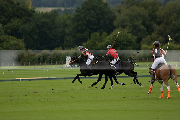Four Quarters Black (black) v Clashleigh (red) in the Autumn Cup subsidiary final polo match on Ambersham 2 at Cowdray Park Polo Club on Sunday 22 September 2013 www.polopictures.co.uk