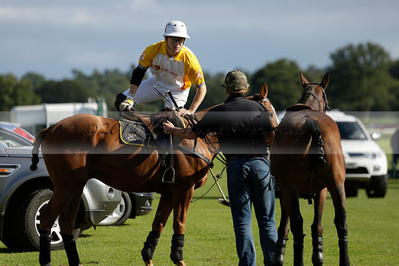 Aryana (black) v Shoreline (yellow) in a Farewell Cup polo match played on Ambersham 5 at Cowdray Park Polo Club on Wednesday 18 September 2013. www.polopictures.co.uk