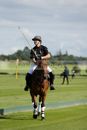 Aryana (black) v Shoreline (yellow) in a Farewell Cup polo match played on Ambersham 5 at Cowdray Park Polo Club on Wednesday 18 September 2013. www.polopictures.co.uk