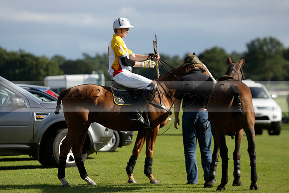 Aryana (black) v Shoreline (yellow) in a Farewell Cup polo match played on Ambersham 5 at Cowdray Park Polo Club on Wednesday 18 September 2013. www.polopictures.co.uk