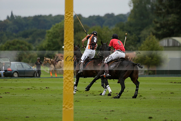 Four Quarters Black (black) v Clashleigh (red) in the Autumn Cup subsidiary final polo match on Ambersham 2 at Cowdray Park Polo Club on Sunday 22 September 2013 www.polopictures.co.uk