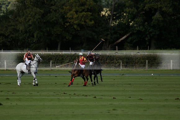 Four Quarters Black (black) v BHC (red) in a Autumn Cup polo match on Ambersham 2 at Cowdray Park Polo Club on Friday 20 September 2013 www.polopictures.co.uk