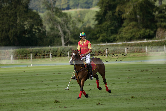 Four Quarters Black (black) v BHC (red) in a Autumn Cup polo match on Ambersham 2 at Cowdray Park Polo Club on Friday 20 September 2013 www.polopictures.co.uk