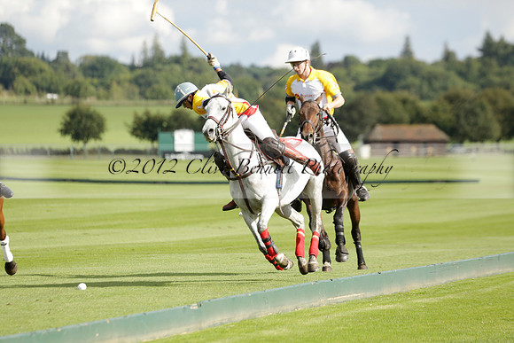 Aryana (black) v Shoreline (yellow) in a Farewell Cup polo match played on Ambersham 5 at Cowdray Park Polo Club on Wednesday 18 September 2013. www.polopictures.co.uk