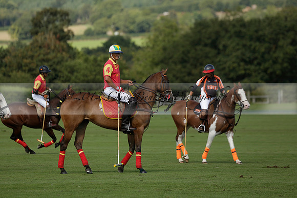 Four Quarters Black (black) v BHC (red) in a Autumn Cup polo match on Ambersham 2 at Cowdray Park Polo Club on Friday 20 September 2013 www.polopictures.co.uk