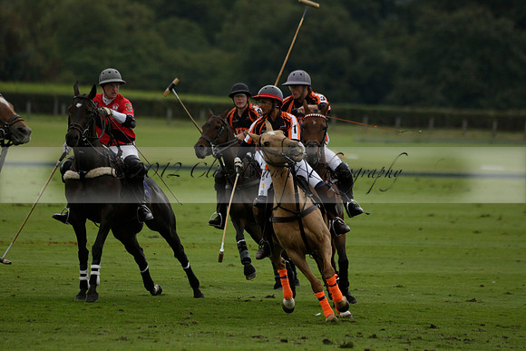 Four Quarters Black (black) v Clashleigh (red)in a Jaeger Le Coultre Autumn Cup polo match played on Ambersham 2 at Cowdray Park Polo Club on Wednesday 2013.09.11 www.polopictures.co.uk