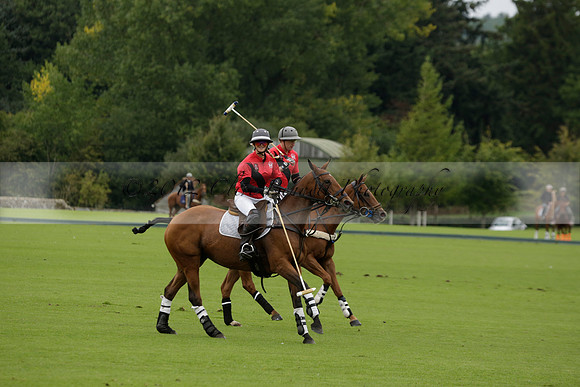Four Quarters Black (black) v Clashleigh (red) in the Autumn Cup subsidiary final polo match on Ambersham 2 at Cowdray Park Polo Club on Sunday 22 September 2013 www.polopictures.co.uk