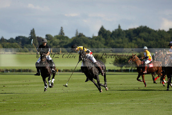 Aryana (black) v Shoreline (yellow) in a Farewell Cup polo match played on Ambersham 5 at Cowdray Park Polo Club on Wednesday 18 September 2013. www.polopictures.co.uk