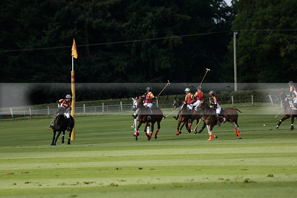 Four Quarters Black (black) v BHC (red) in a Autumn Cup polo match on Ambersham 2 at Cowdray Park Polo Club on Friday 20 September 2013 www.polopictures.co.uk