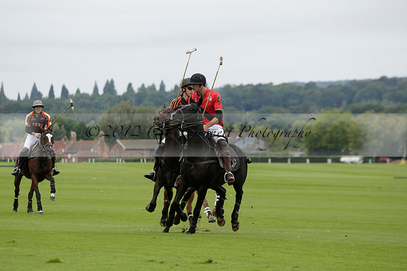 Four Quarters Black (black) v Clashleigh (red) in the Autumn Cup subsidiary final polo match on Ambersham 2 at Cowdray Park Polo Club on Sunday 22 September 2013 www.polopictures.co.uk