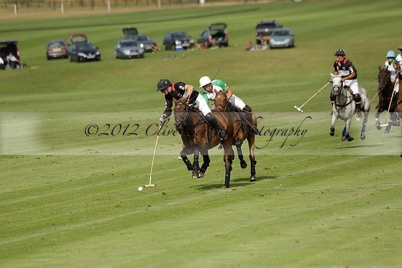 Jaeger Le Coultre (black)  v Wairakei Pastoral (white) in a Jaeger Le Coultre Holden White Cup polo match played on 29 July 2013 at Cowdray Park Polo Club on Brooksfieldwww.polopictures.co.uk